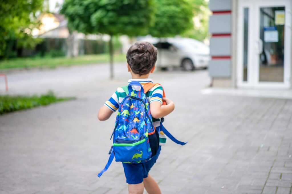 child first day school backpack