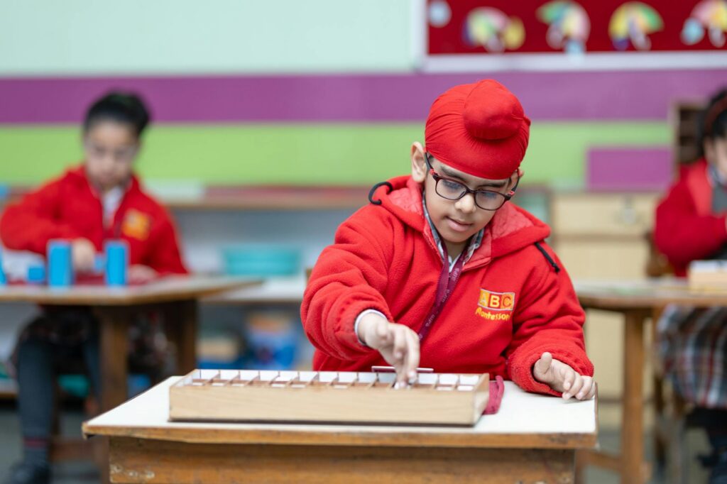 kindergarten children playing montessori classroom