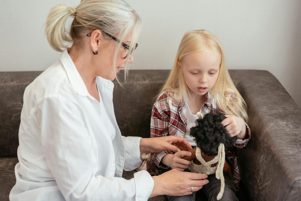 pediatrician examining toddler development