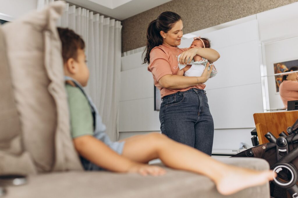 midwife visiting mother newborn baby home care postpartum