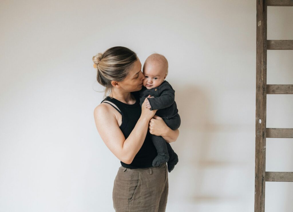 postpartum recovery gentle exercise mother with baby