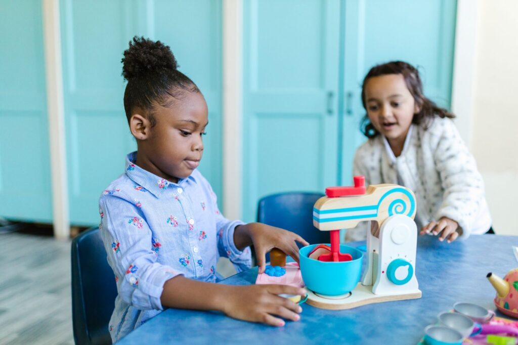 diverse children playing kindergarten